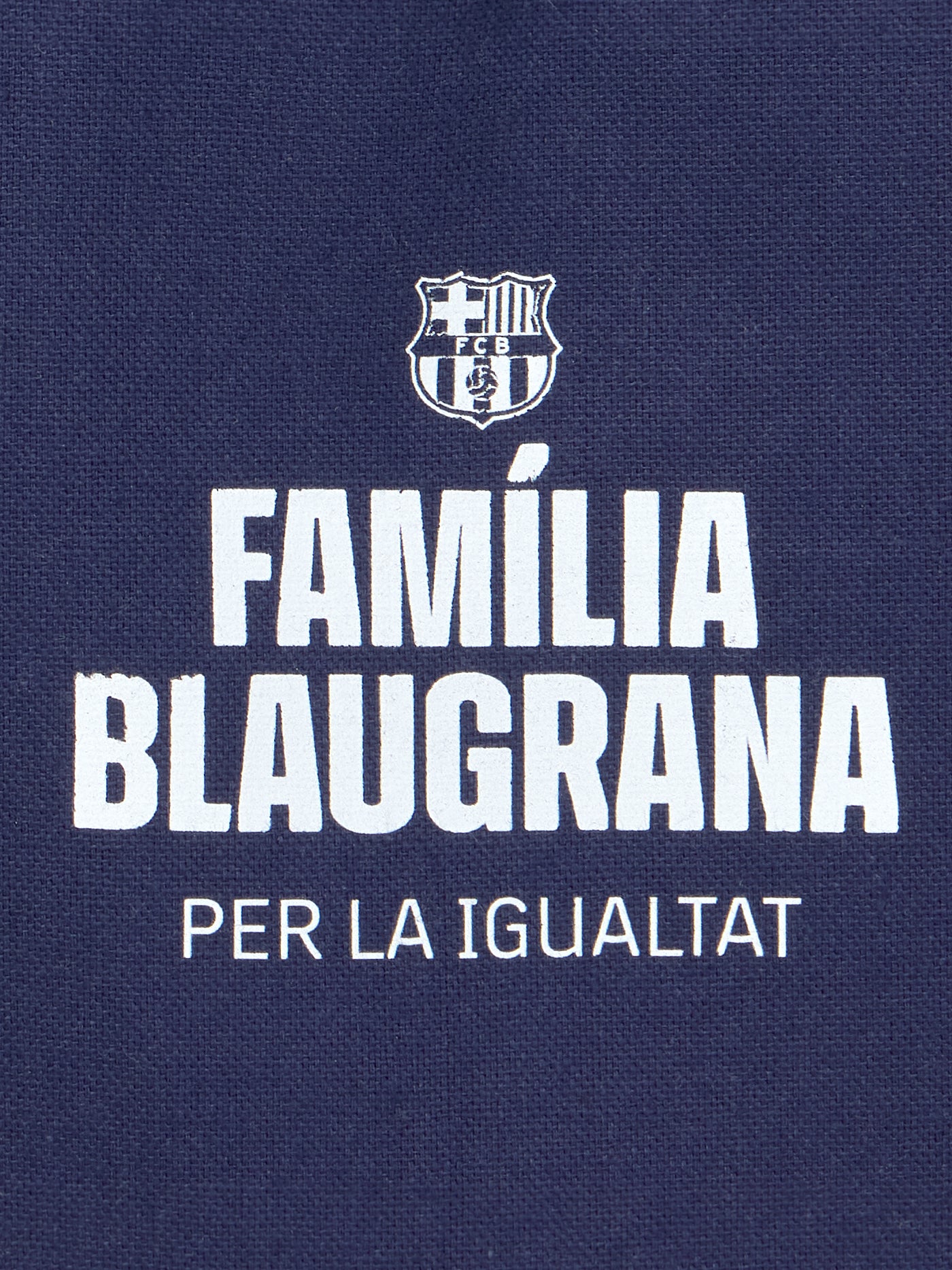 Navy blue FC Barcelona tote bag with 'Familia Blaugrana' text and shield outline design