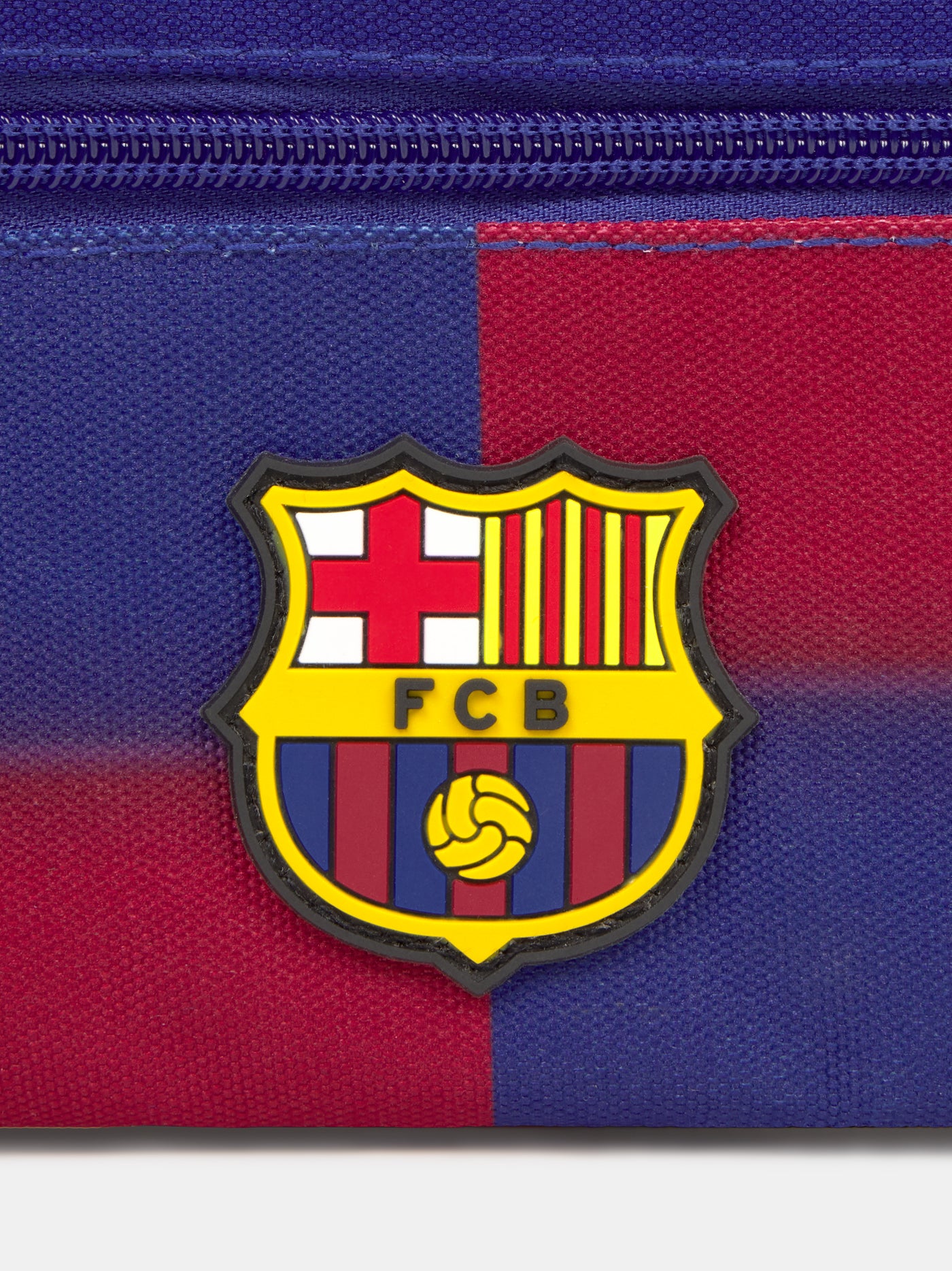 Red and blue pencil case with FC Barcelona crest and branded zipper pulls.