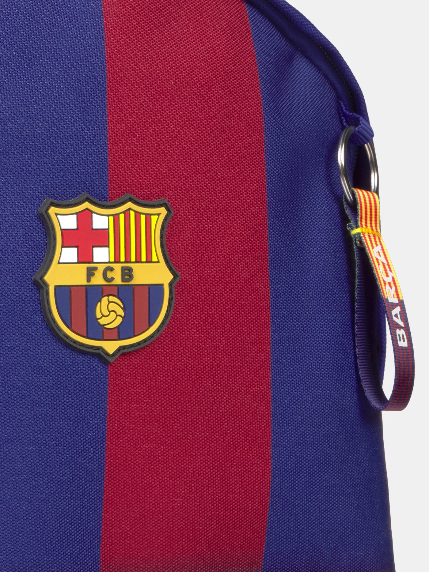 Striped red and blue backpack with FC Barcelona crest and 'Barça' text on the front pocket
