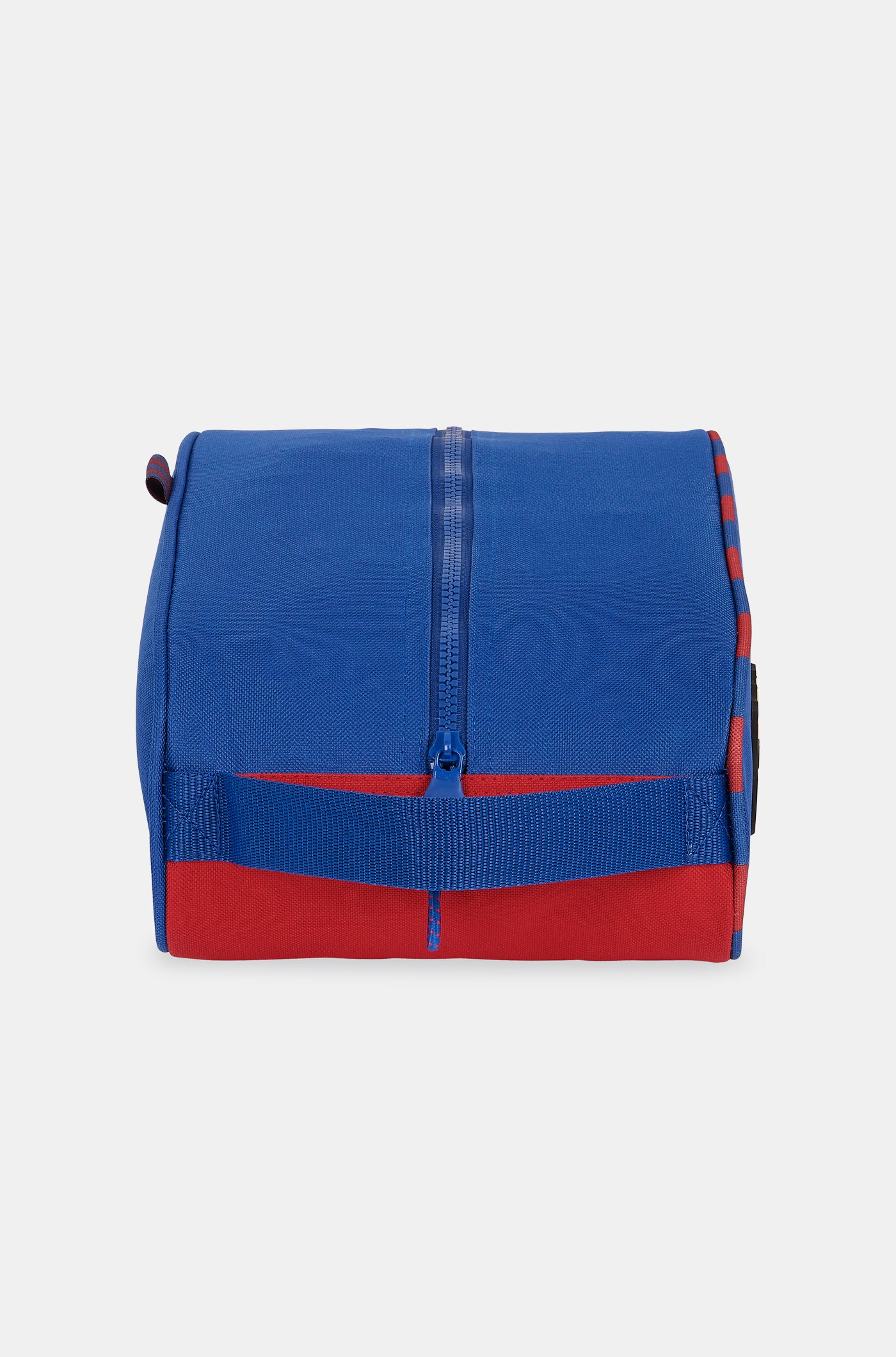 Blue toiletry bag with red accents, featuring the FC Barcelona crest and 'BARÇA' text on a white side panel.