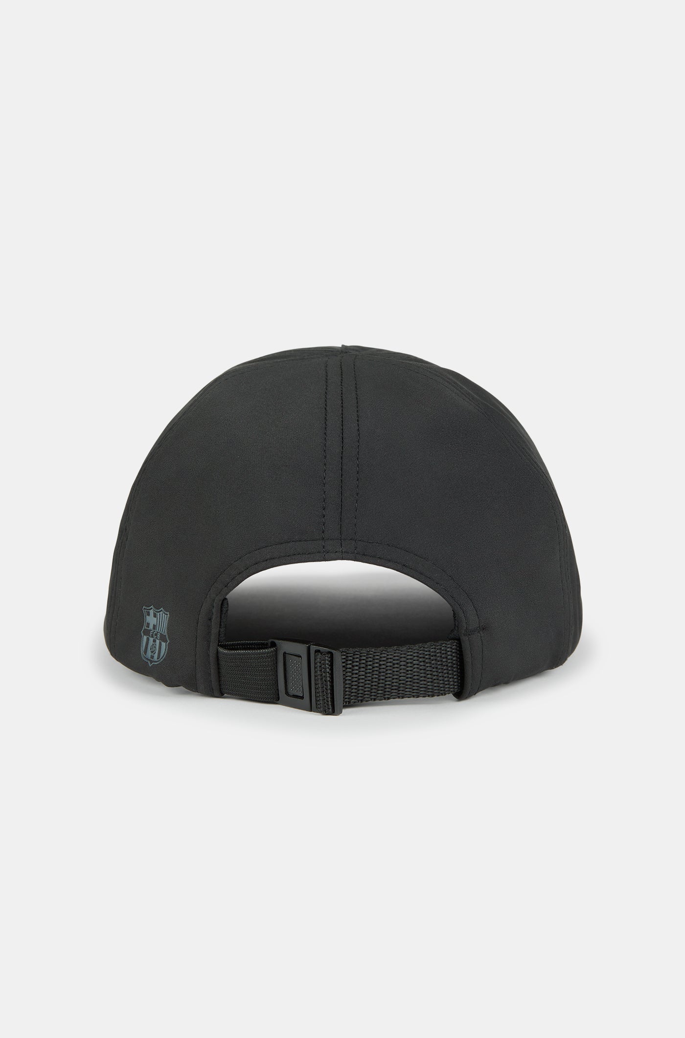 Black baseball cap with the word 'Barça' in metallic-style lettering on the front.