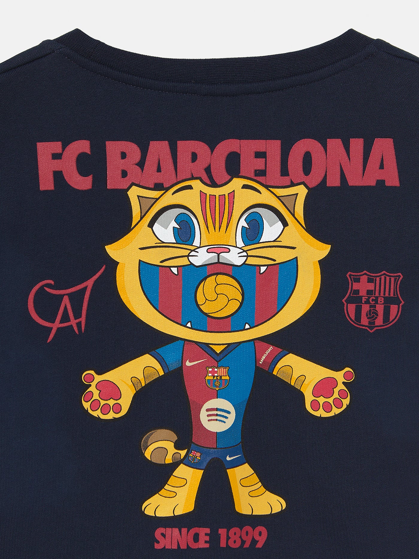 Navy blue kids’ sweatshirt featuring a large back graphic of Cat Culer, the FC Barcelona mascot, with the text 'FC BARCELONA' and 'Since 1899' in bold red and yellow.