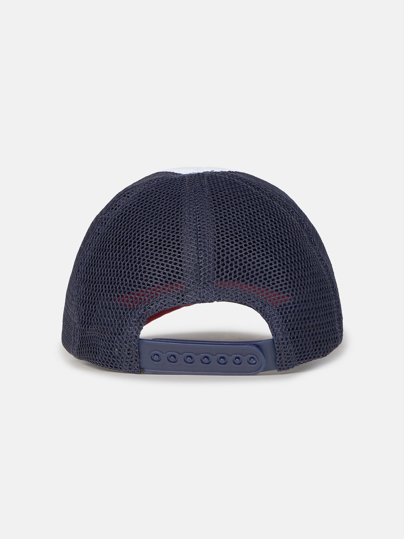 Trucker-style cap with red visor, white front panel featuring a colorful FC Barcelona crest and embroidered 'Barça' text, and black mesh back.