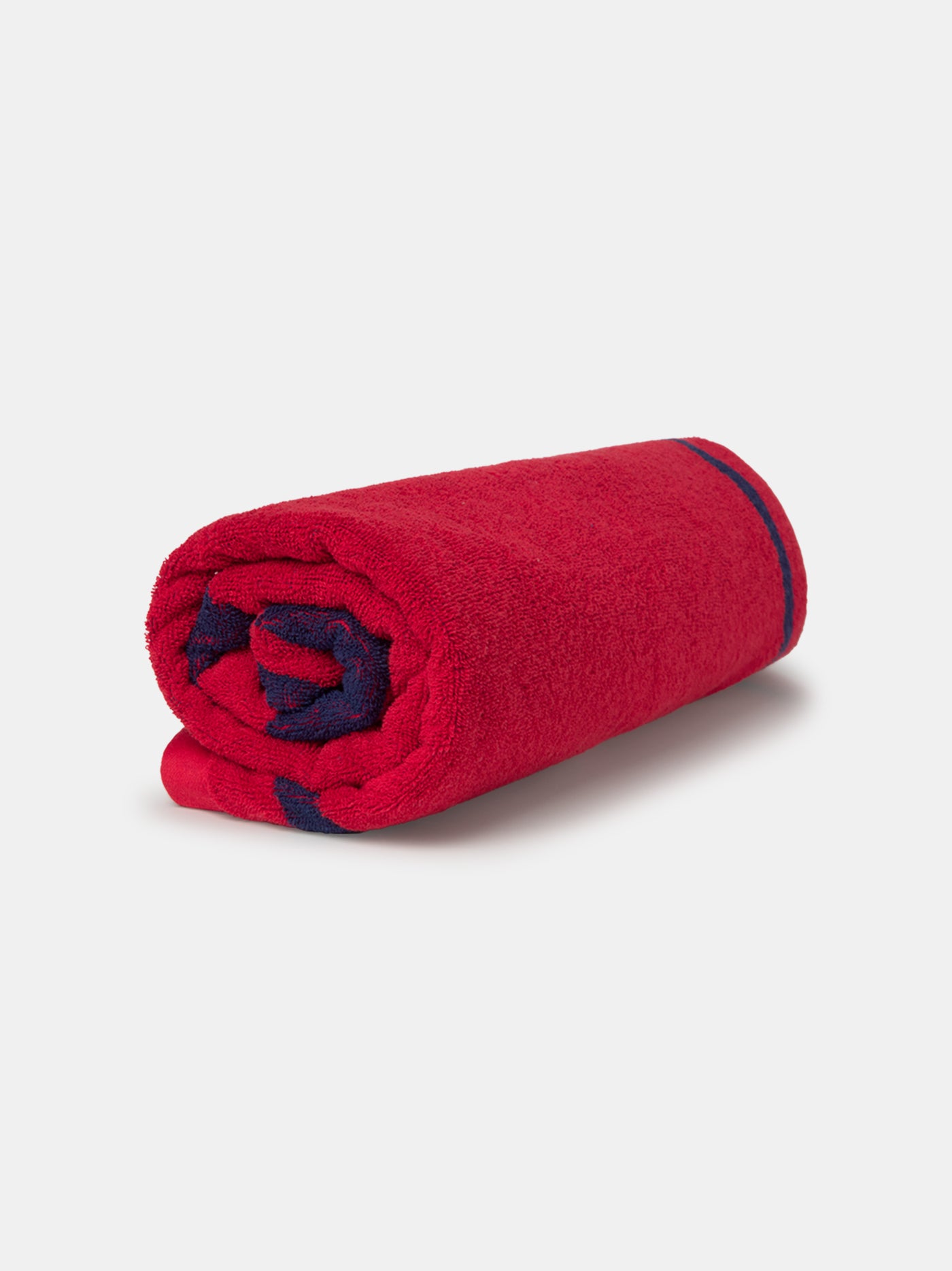 Red FC Barcelona towel featuring the word "Barça" in large navy script, with "TOTS UNITS FEM FORÇA" vertically on the left and "FC BARCELONA" with club crest on the right side