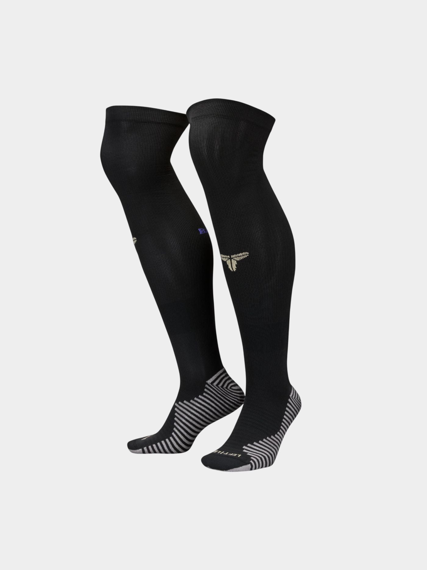 Pair of black FC Barcelona football socks featuring the Kobe Bryant tribute logo in white and reinforced grey-striped soles for grip and comfort