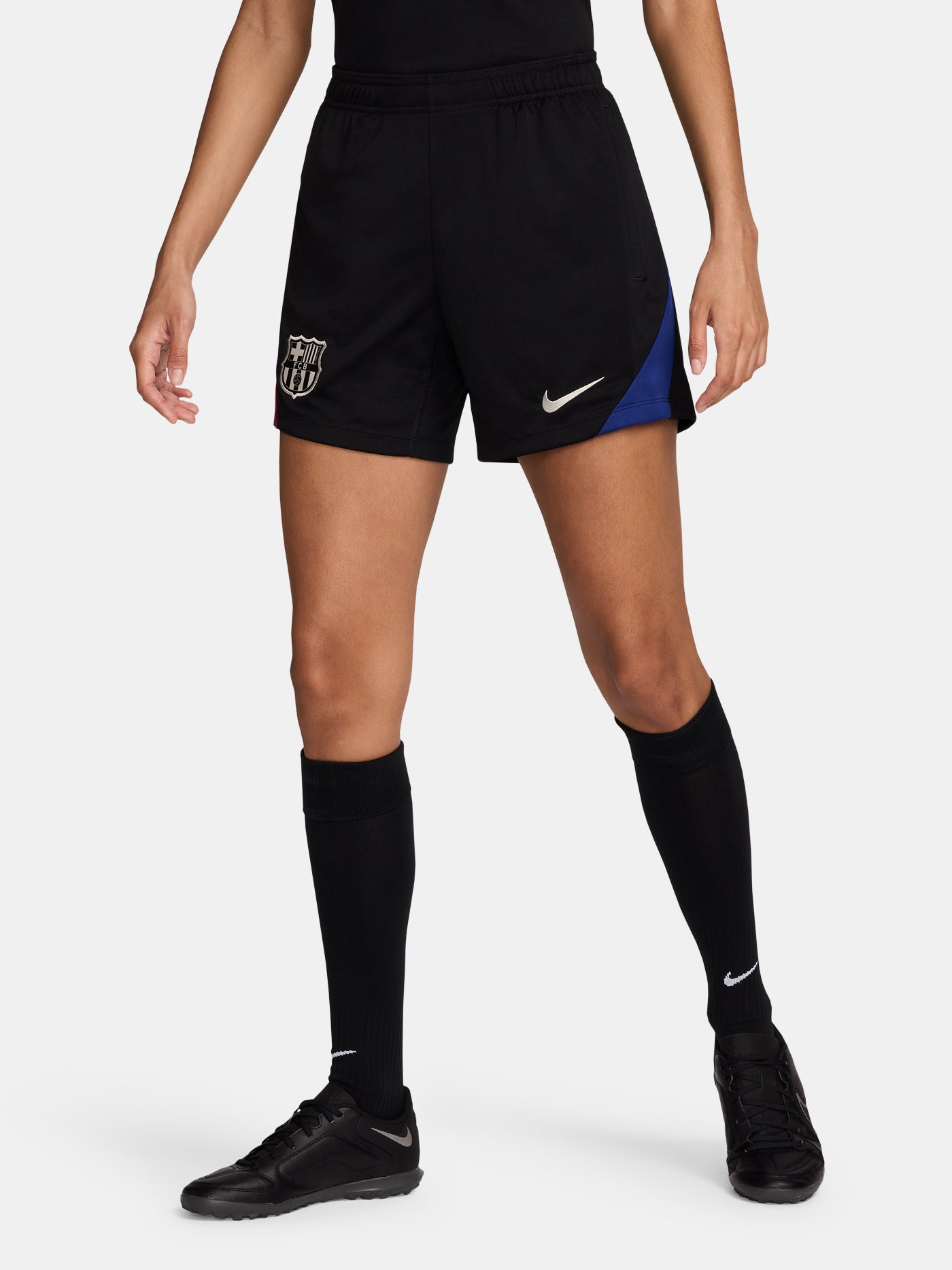 FC Barcelona black shorts with white crest, Nike logo, and red-blue side accents.