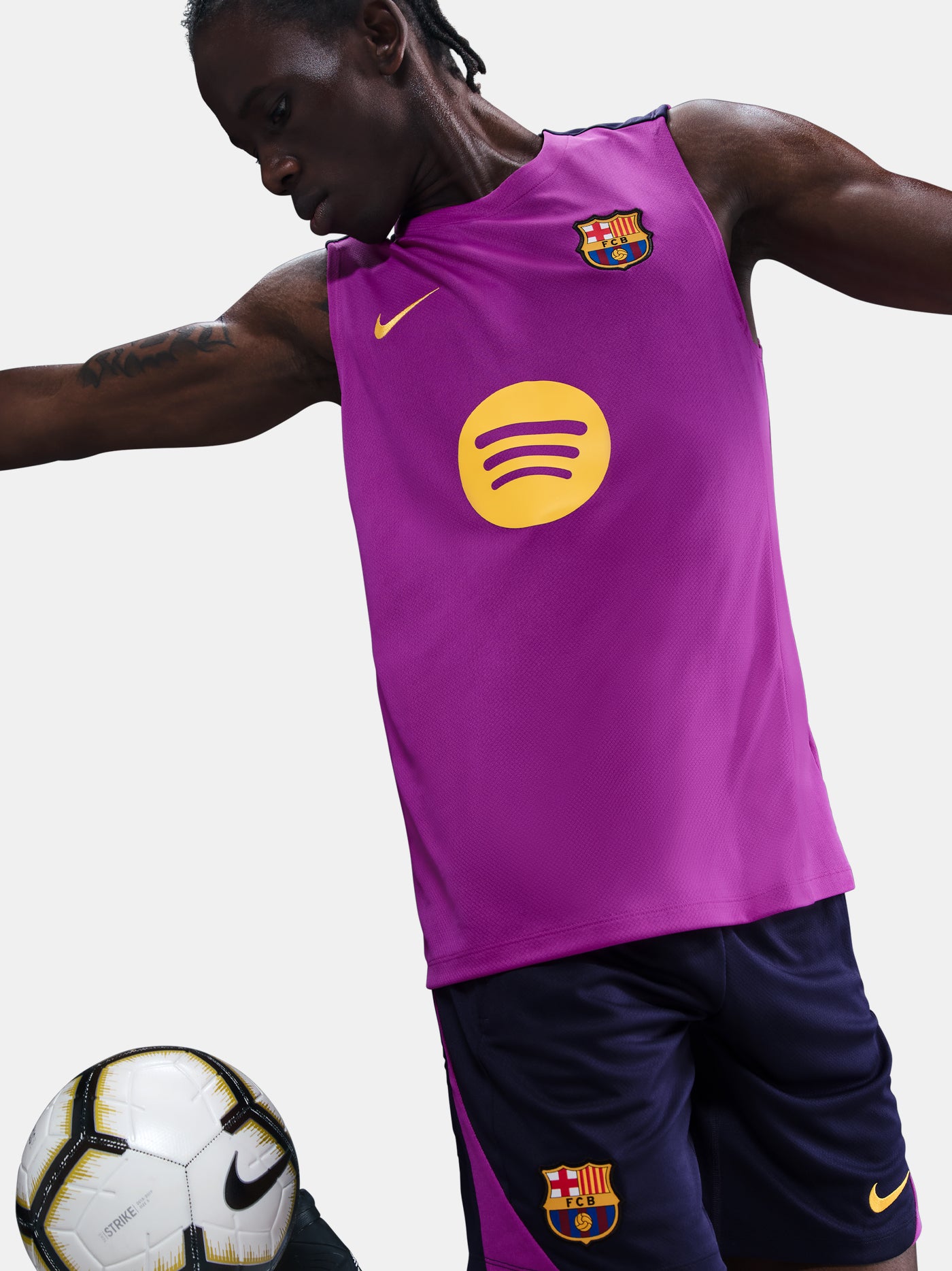 Purple FC Barcelona tank with yellow Nike logo, club crest, and Spotify sponsor on the front.