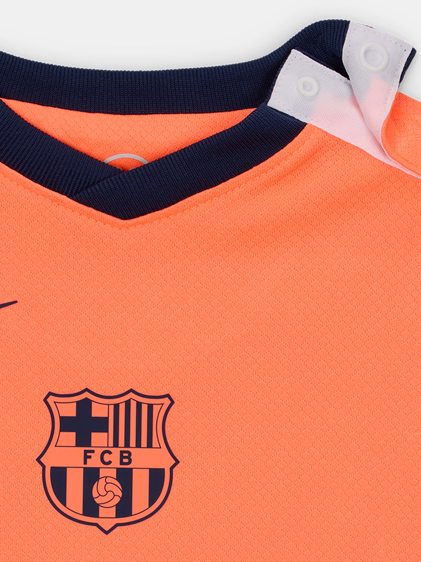 FC Barcelona 2025/26 third kit for toddlers in orange with navy blue details, including shirt, shorts, and socks.