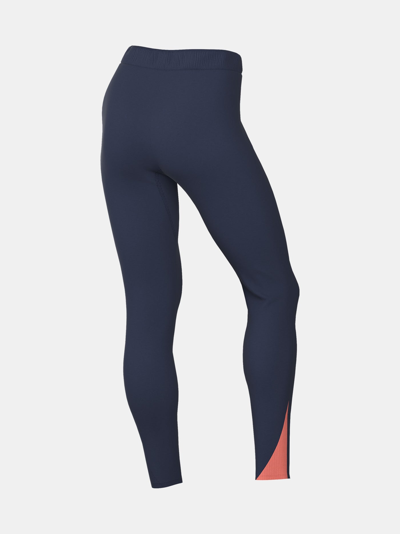 FC Barcelona navy blue training pants with slim fit, featuring the club crest and Nike logo in coral on the front