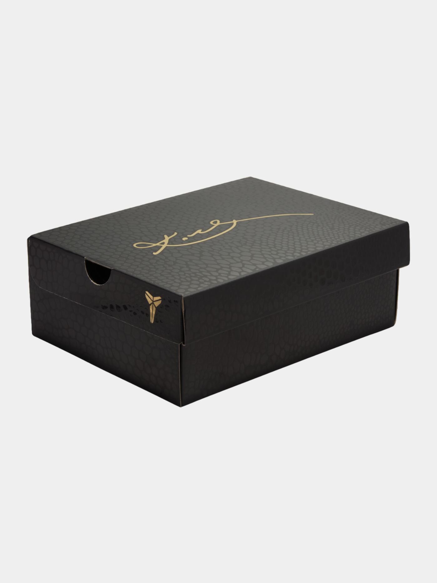 Black shoe box with gold logo and text on a white background