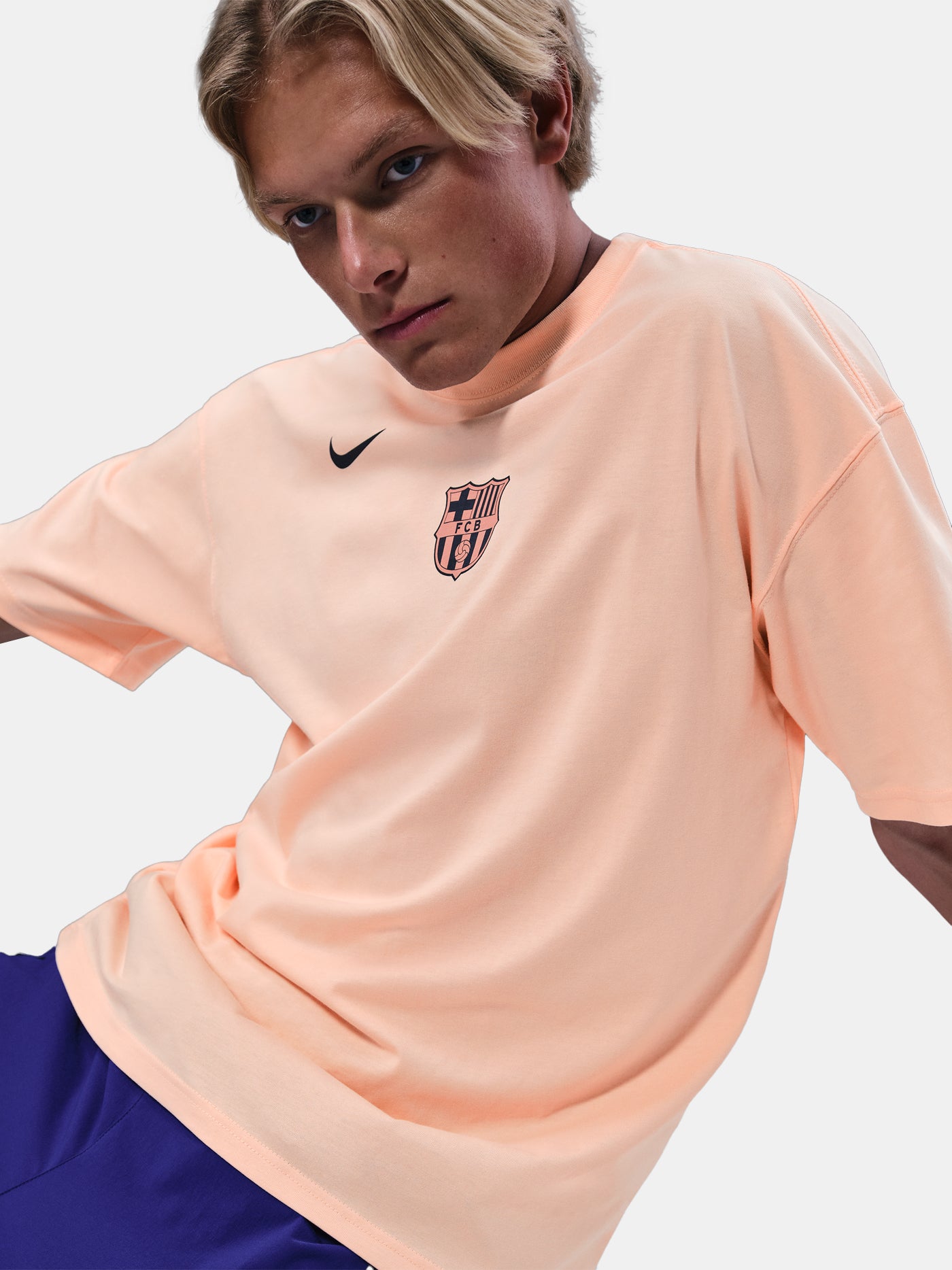 Light peach FC Barcelona Nike t-shirt with short sleeves and club crest on the chest
