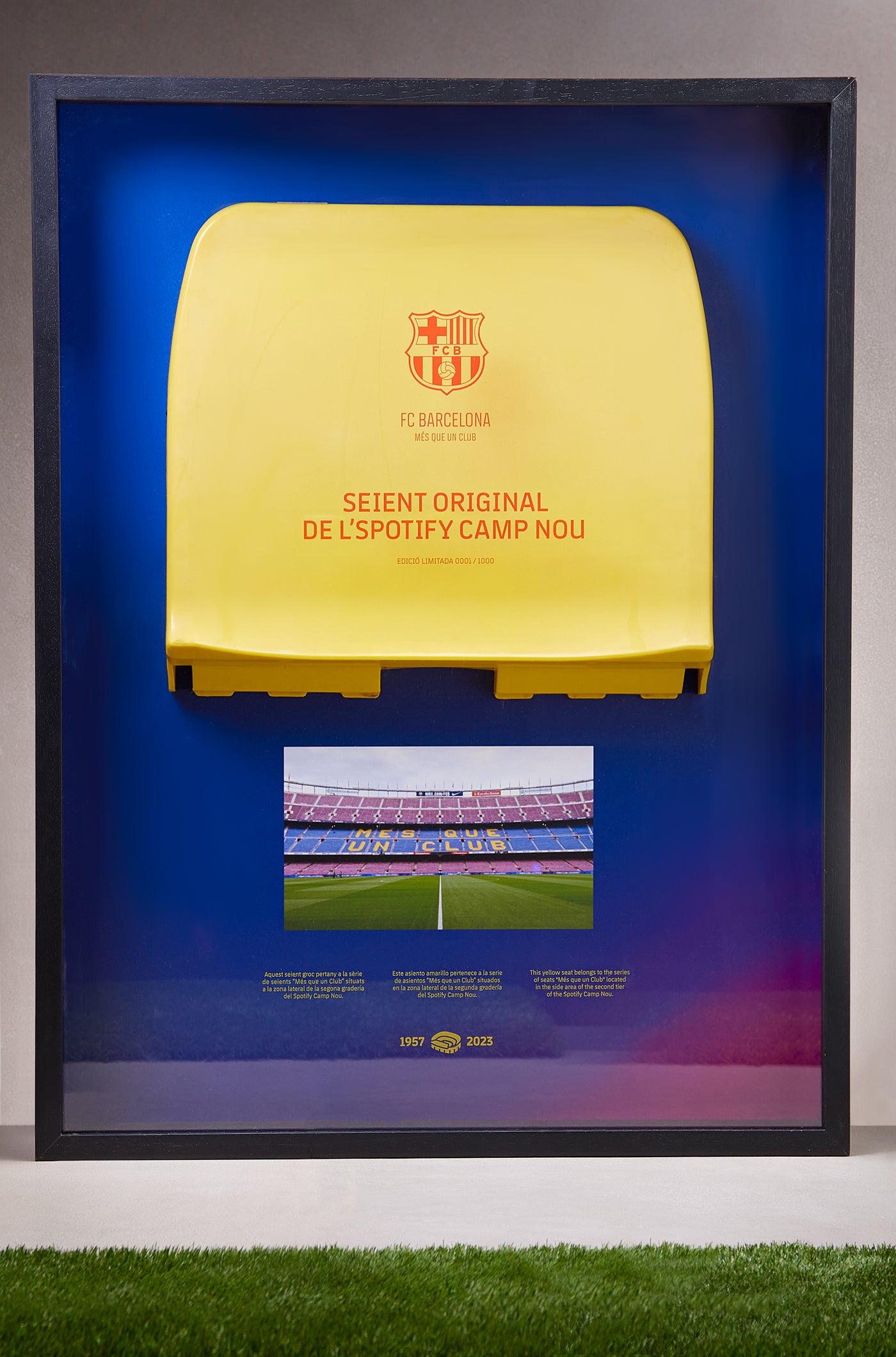Framed original yellow seat from Spotify Camp Nou with FC Barcelona crest and commemorative plaque
