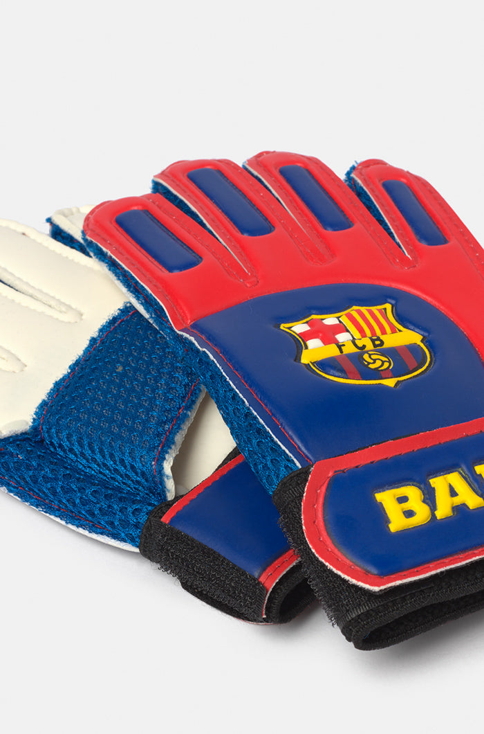 Pair of FC Barcelona goalkeeper gloves in red, blue, and white, featuring the club crest and 'BARÇA' text on the wrist strap