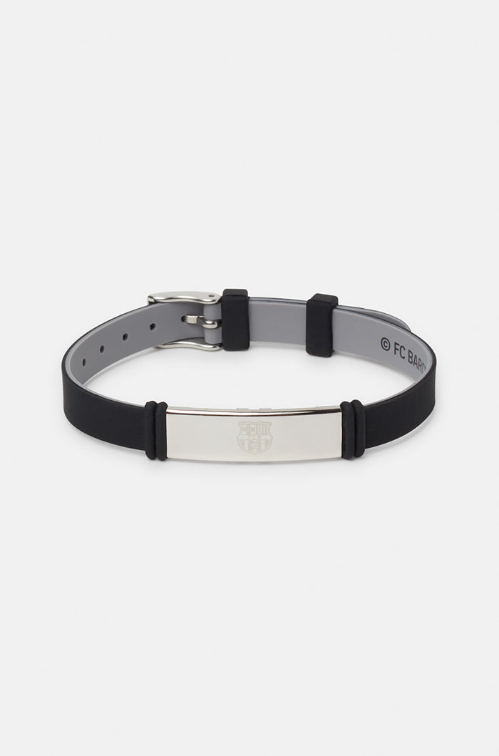 Black and grey bracelet with a metallic plate engraved with the FC Barcelona crest