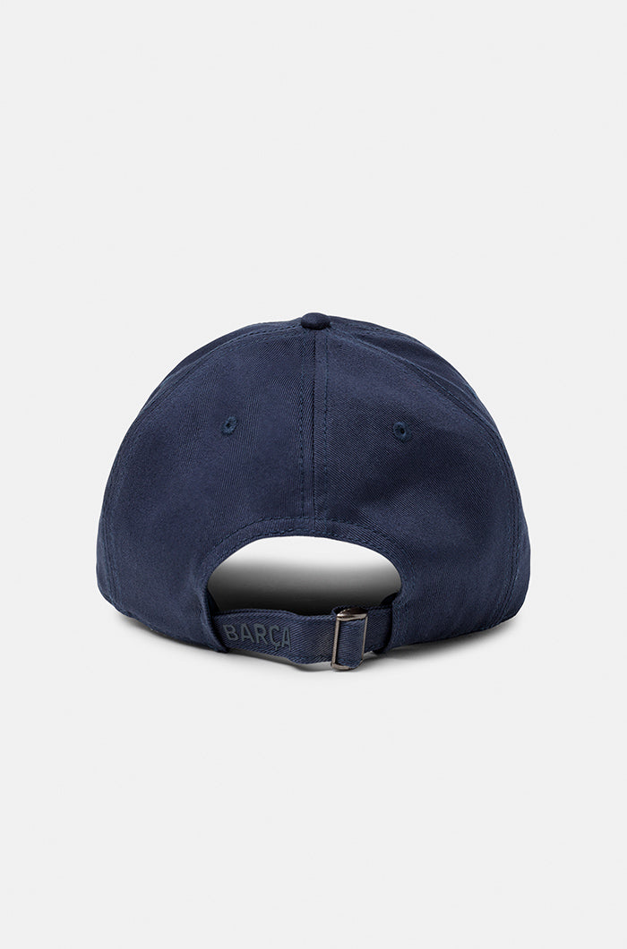 Dark blue FC Barcelona baseball cap with a tonal embroidered Barça crest on the front, featuring a curved brim and classic six-panel design.