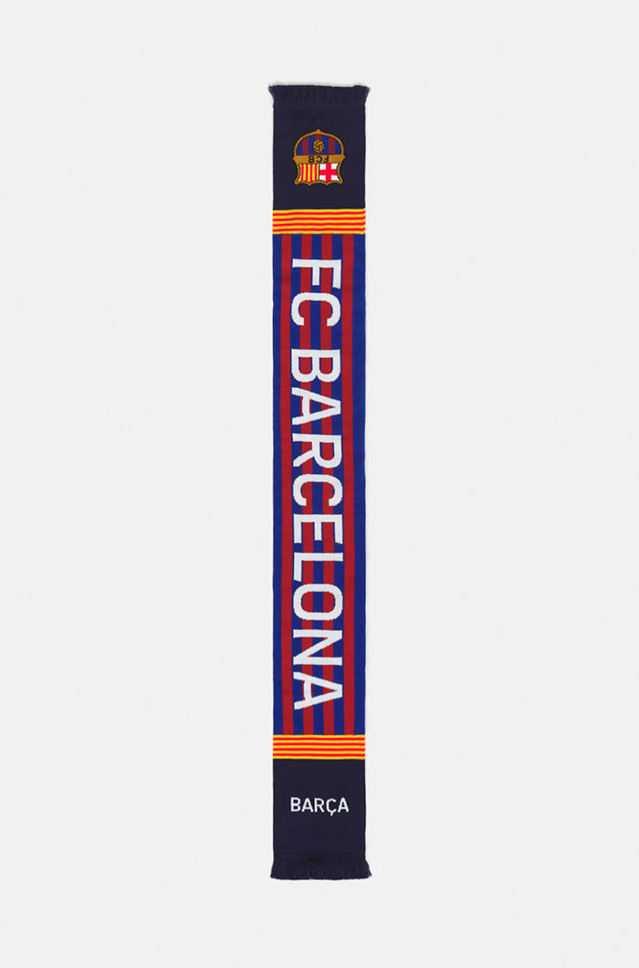 Double-sided FC Barcelona scarf with blue and red vertical stripes, featuring the club crest and the words 'FC BARCELONA' on one side and 'BARÇA' with '1899' on the other.