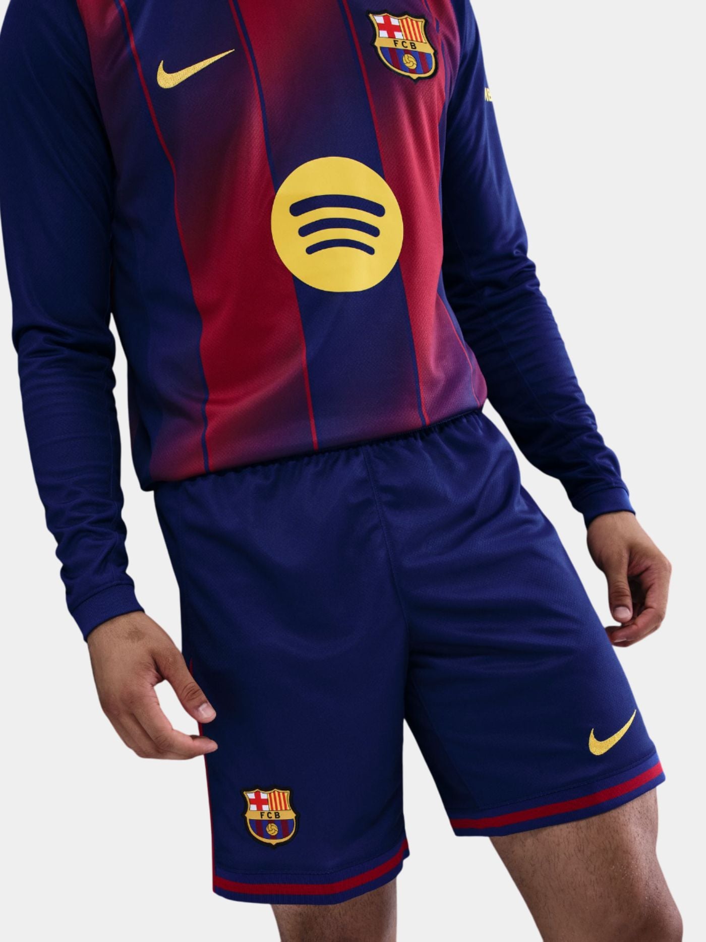 Soccer jersey and shorts with Spotify logo and Nike branding on a white background