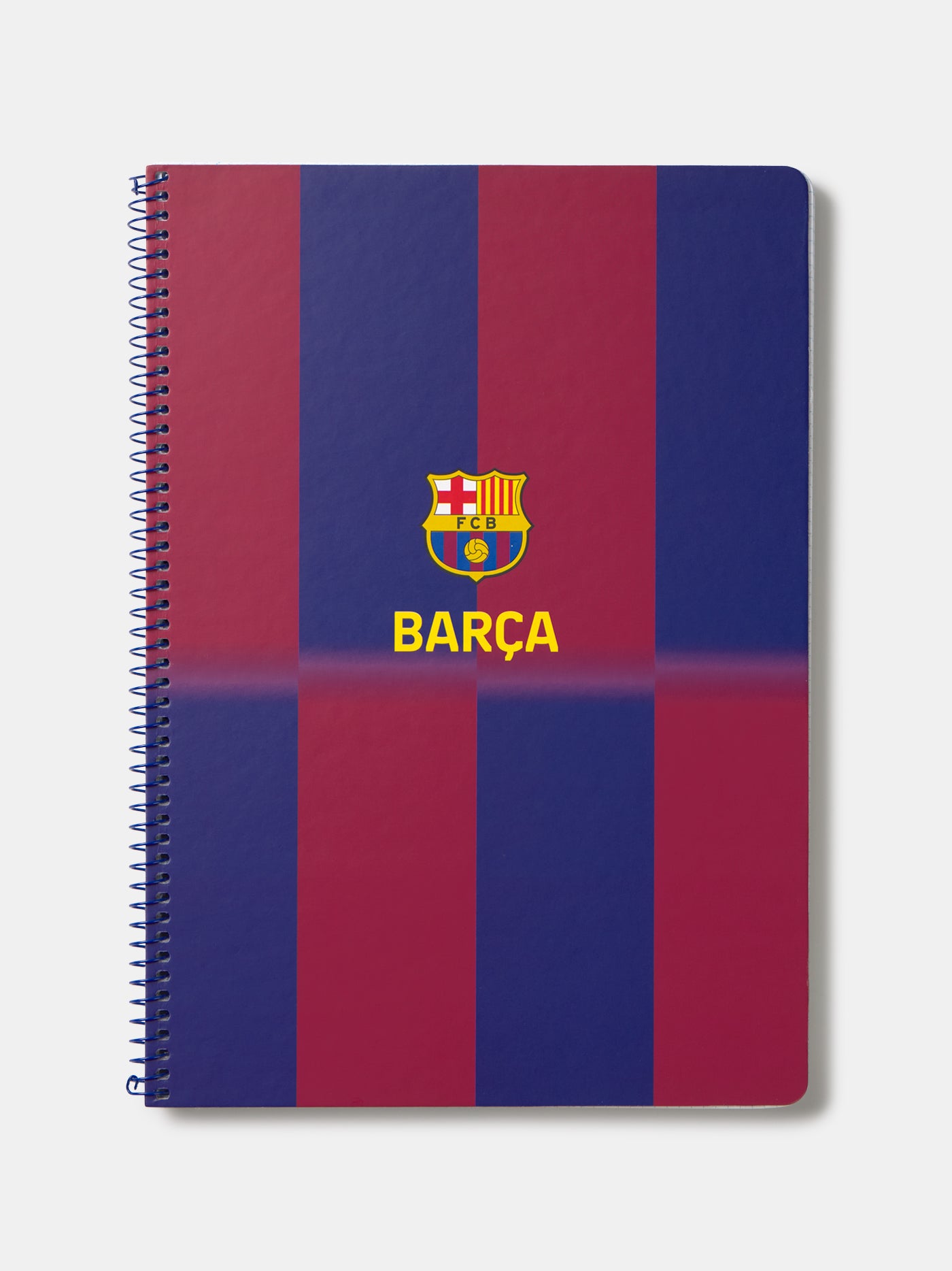 Red and blue striped spiral notebook with FC Barcelona crest and 'Barça' text on the cover