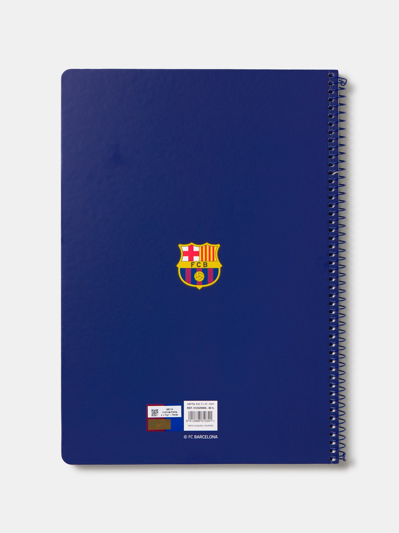 Red and blue striped spiral notebook with FC Barcelona crest and 'Barça' text on the cover