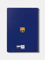 Red and blue striped spiral notebook with FC Barcelona crest and 'Barça' text on the cover