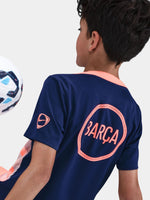 navy FC Barcelona jersey with coral geometric design, featuring the club crest, Nike logo, and Spotify sponsor.