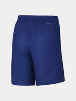 Man in FC Barcelona roller hockey kit with red and blue vertical stripes 