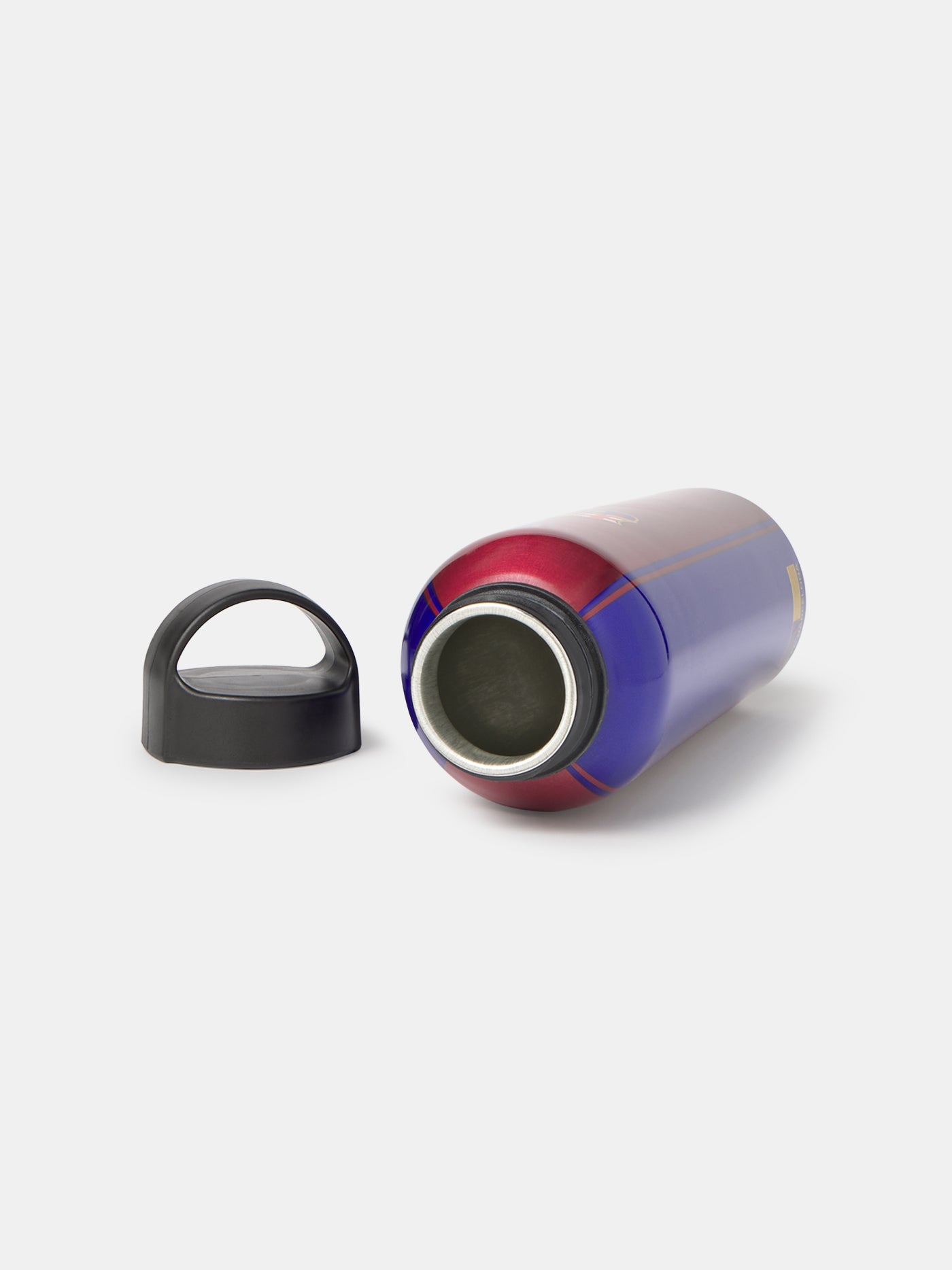 Red and blue aluminum water bottle with FC Barcelona crest on the front.