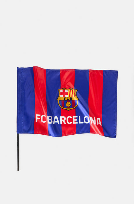 FC Barcelona flag with vertical blue and red stripes, featuring the club crest and 'FC BARCELONA' text in white