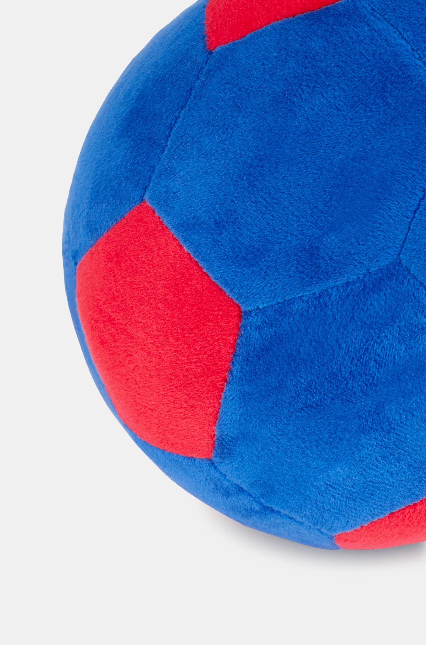 Soft plush football in blue and red with the FC Barcelona crest embroidered on the front.