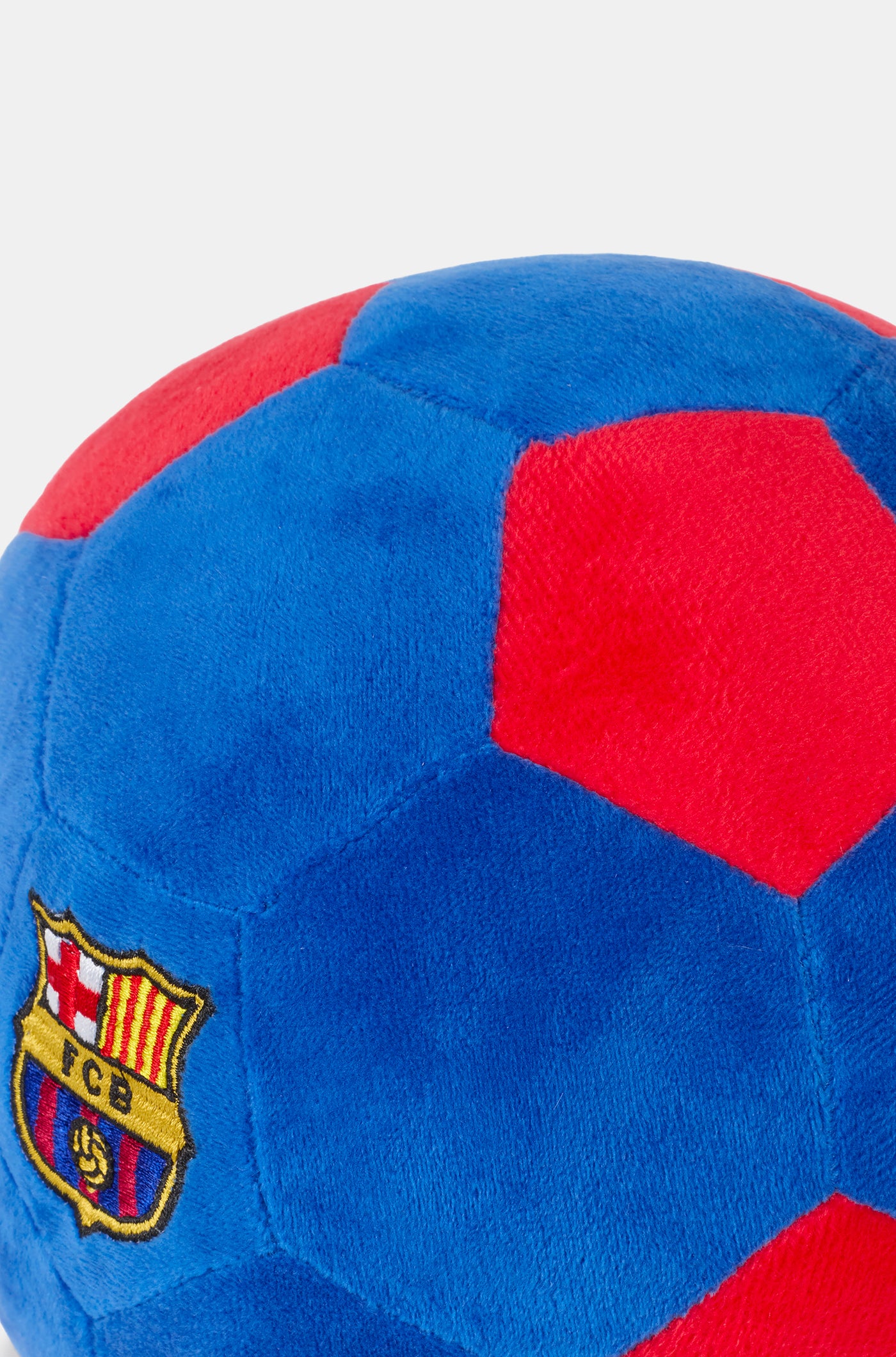 Soft plush football in blue and red with the FC Barcelona crest embroidered on the front.