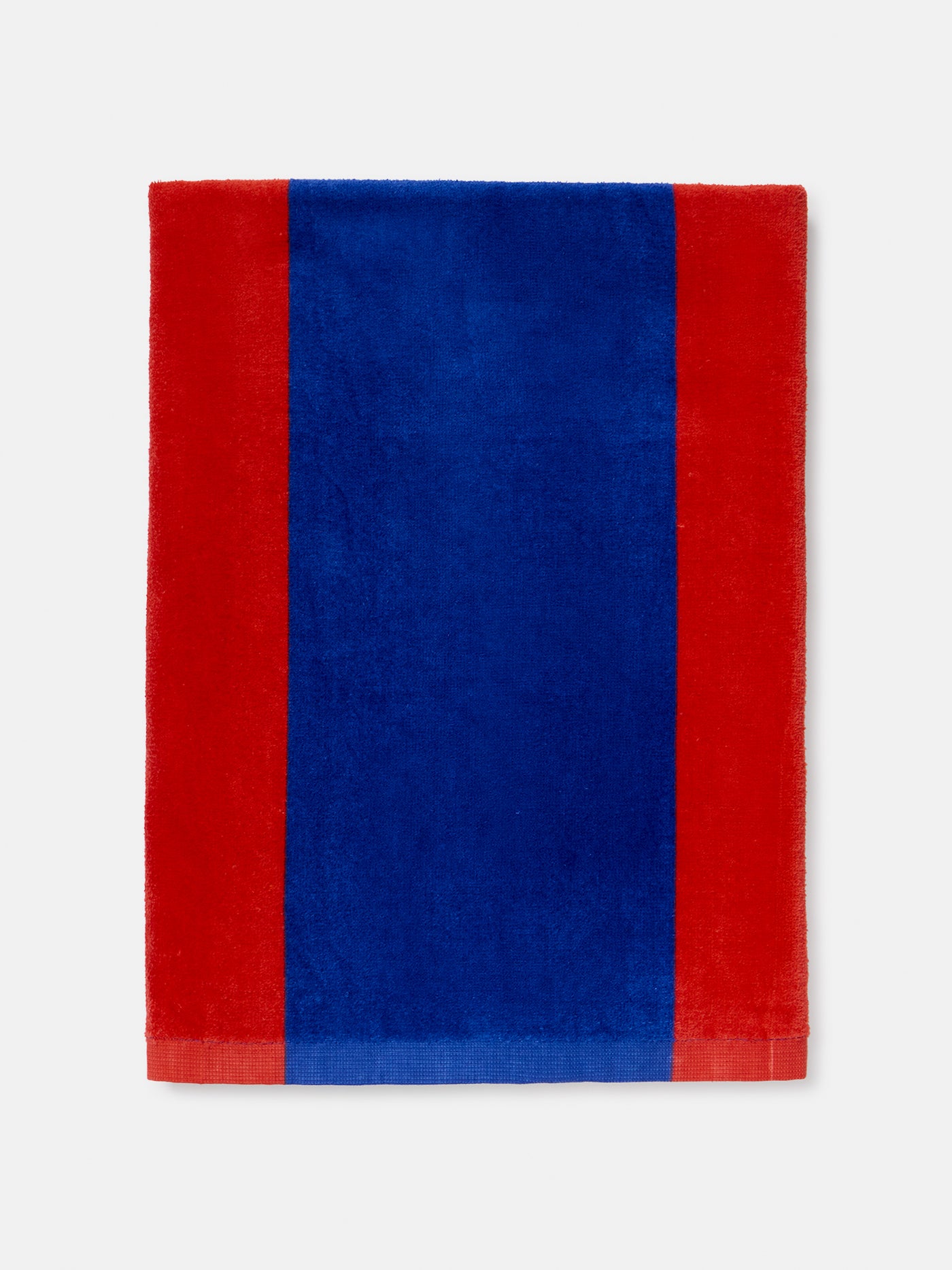 FC Barcelona beach towel featuring vertical blue and red stripes with a large central club crest.