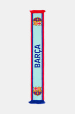 Light blue FC Barcelona scarf with red and blue borders, featuring the word 'BARÇA' in dark blue and the club crest at both ends.
