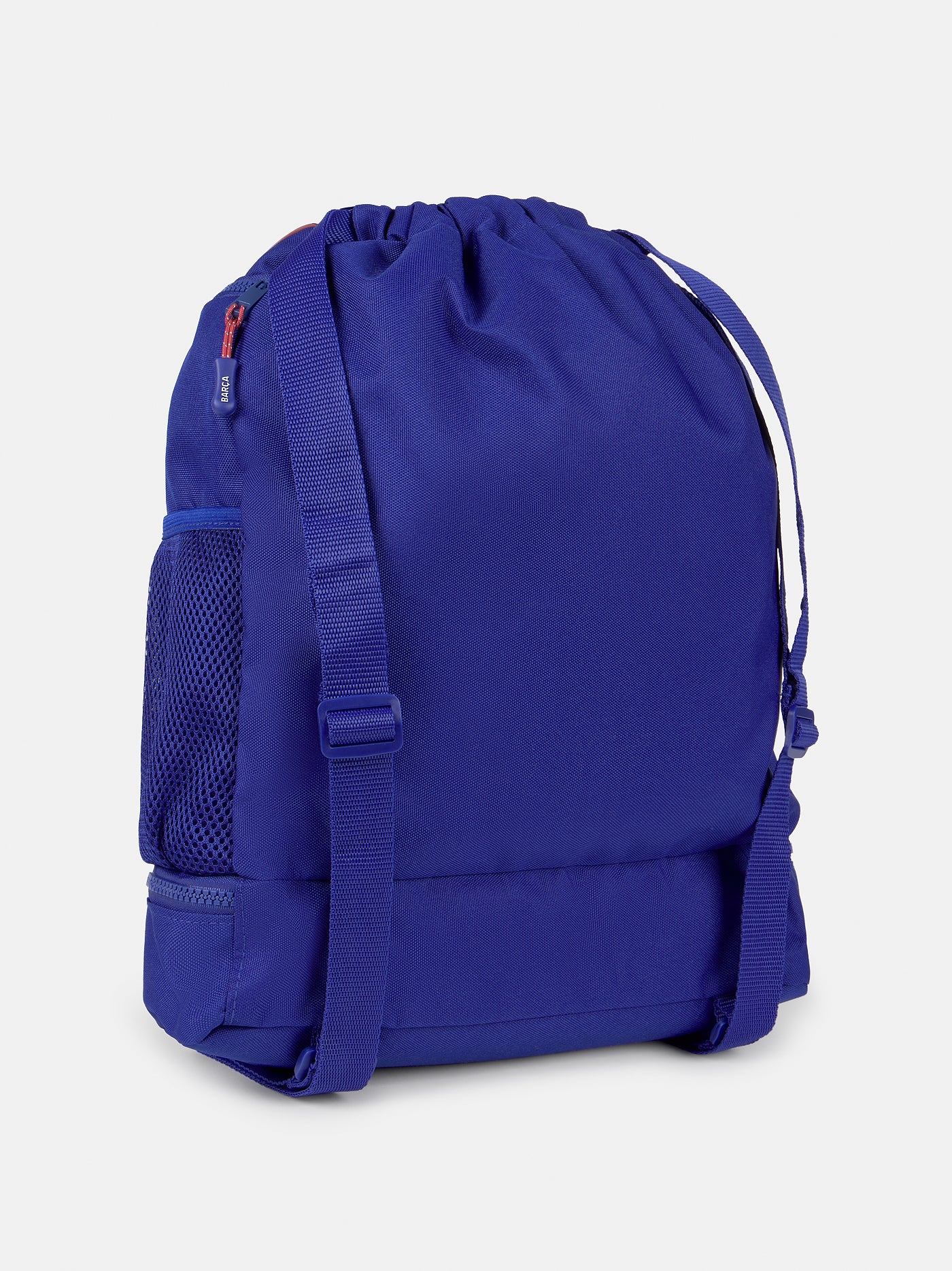 FC Barcelona drawstring backpack with blue and red stripes, club crest, mesh pockets, and zippered bottom compartment