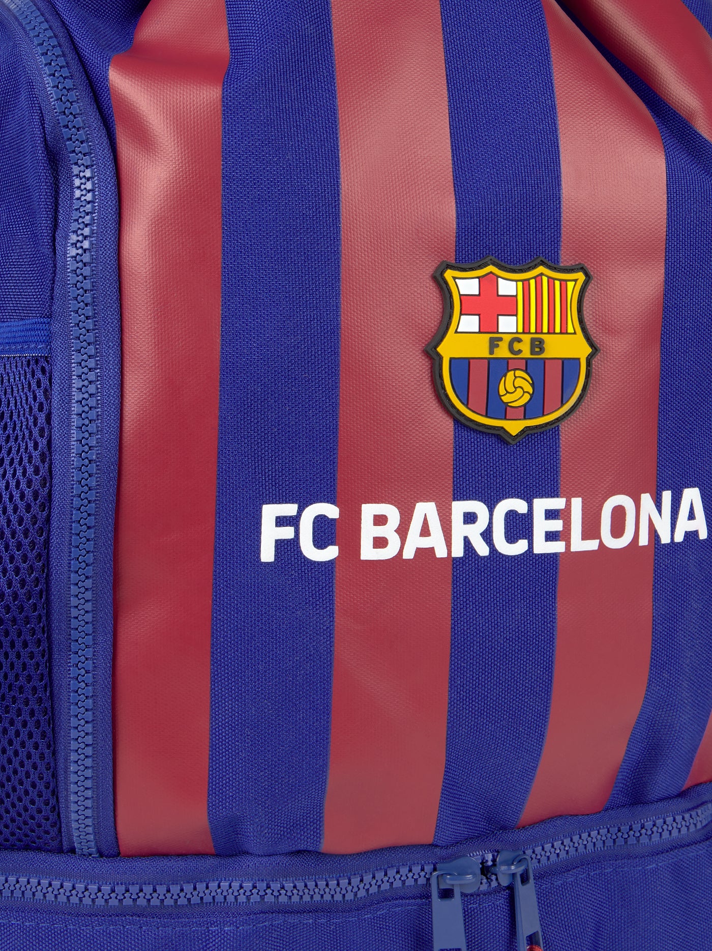 FC Barcelona drawstring backpack with blue and red stripes, club crest, mesh pockets, and zippered bottom compartment
