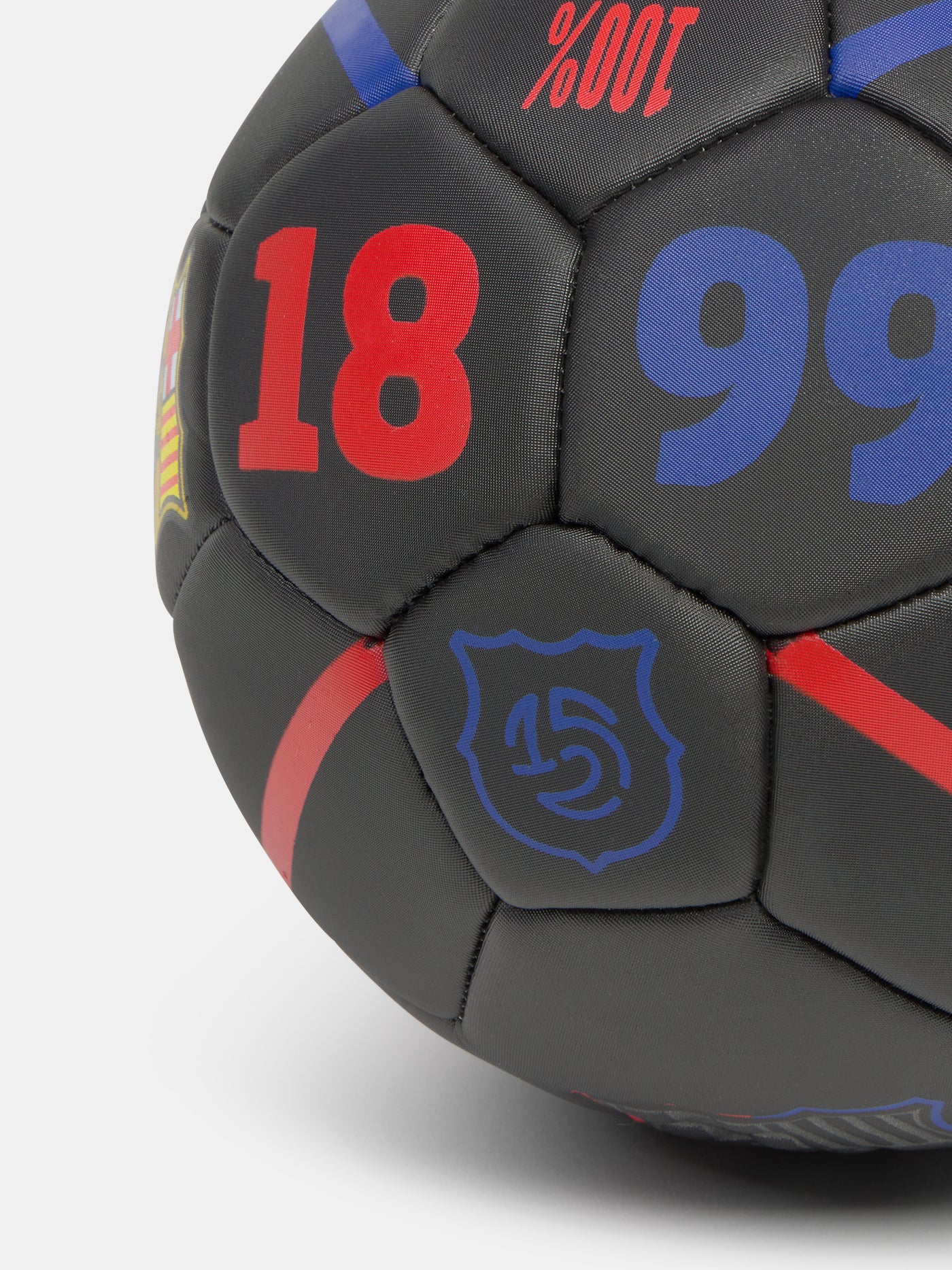 Black size 2 football with red and blue accents, featuring the FC Barcelona crest and the word 'BARÇA' in bold red letters