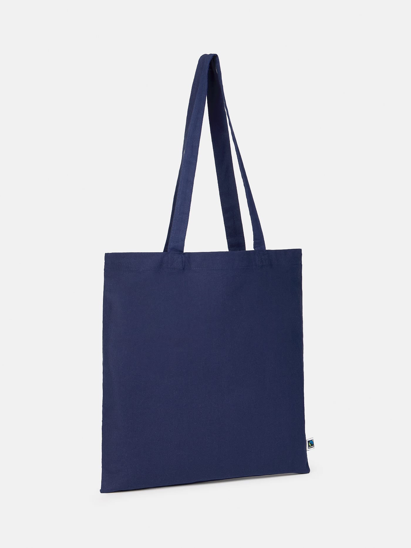 Navy blue FC Barcelona tote bag with 'Familia Blaugrana' text and shield outline design