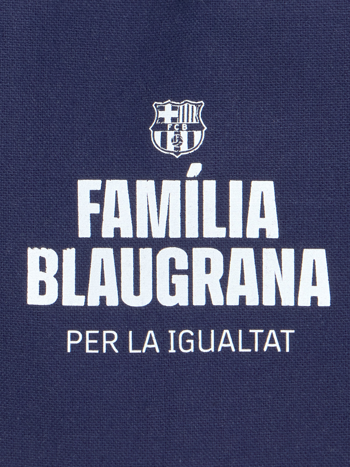 Navy blue FC Barcelona tote bag with 'Familia Blaugrana' text and shield outline design