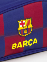Red and blue checkered toiletry bag with FC Barcelona crest and 'Barça' text on the side.