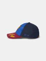 Blue and burgundy FC Barcelona cap with club crest, yellow Raphinha signature, and '1899' embroidered on the side
