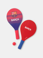 Blue and red paddle and ball beach set with Barça crest.

