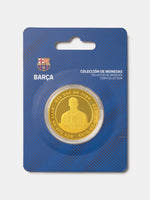 Gold and silver coin in a blue packaging with FC Barcelona logo