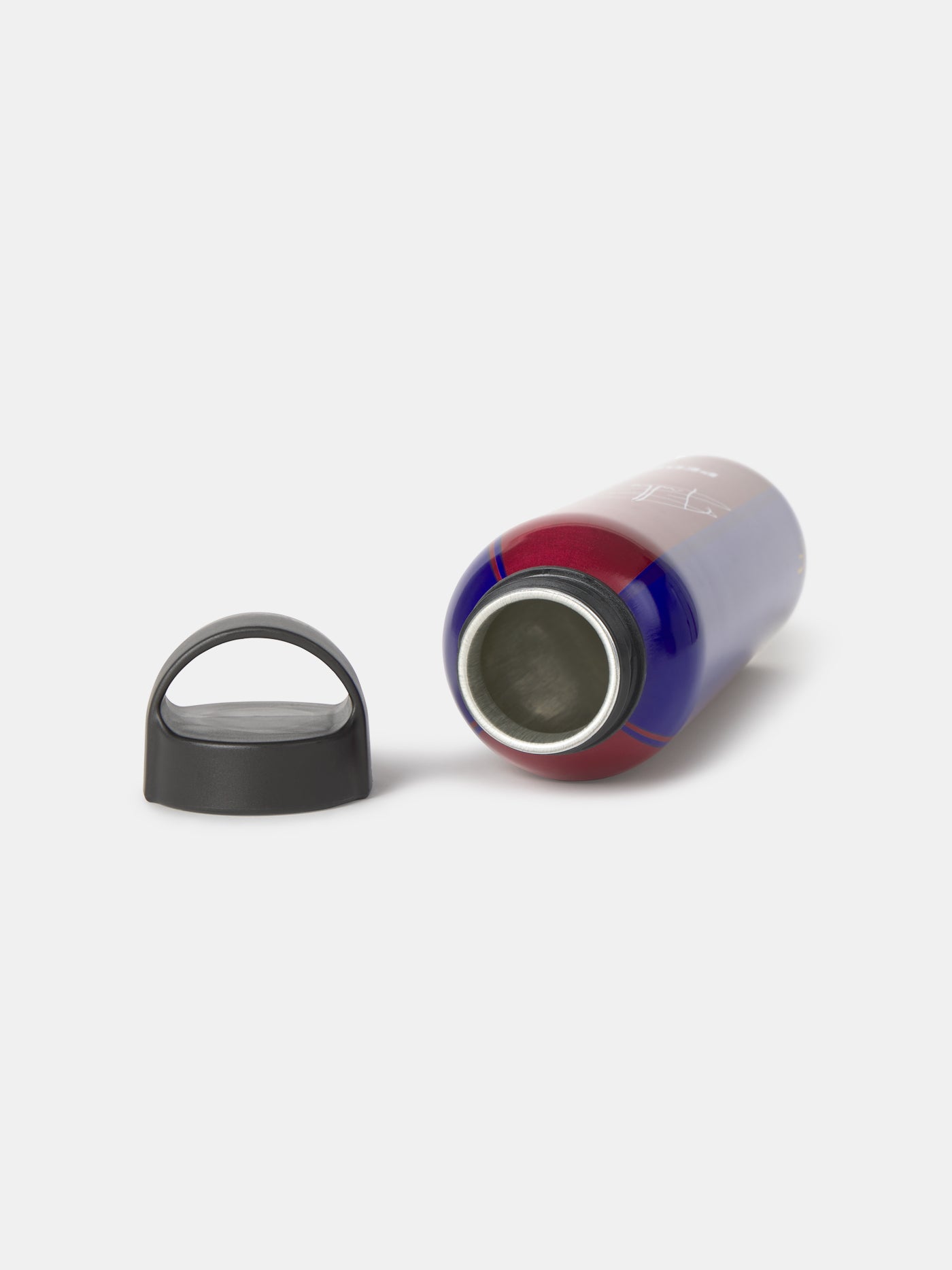 Colorful water bottle with black cap on a white background