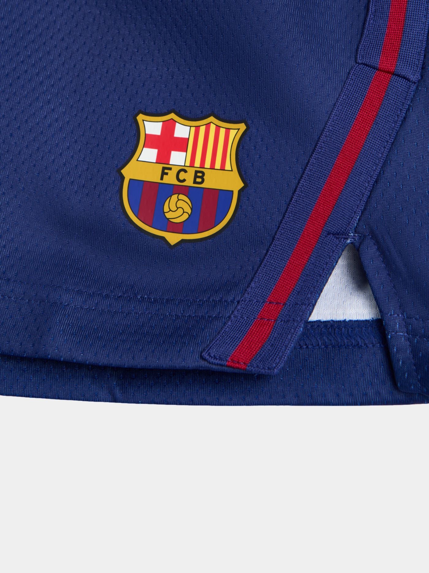Man in FC Barcelona roller hockey kit with red and blue vertical stripes 