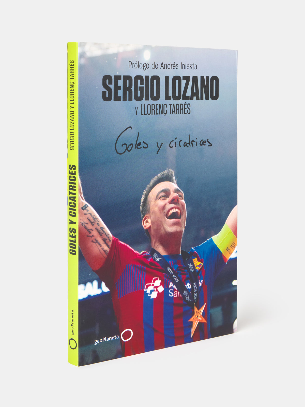 Book cover featuring a soccer player in a red and blue jersey with text on a white background