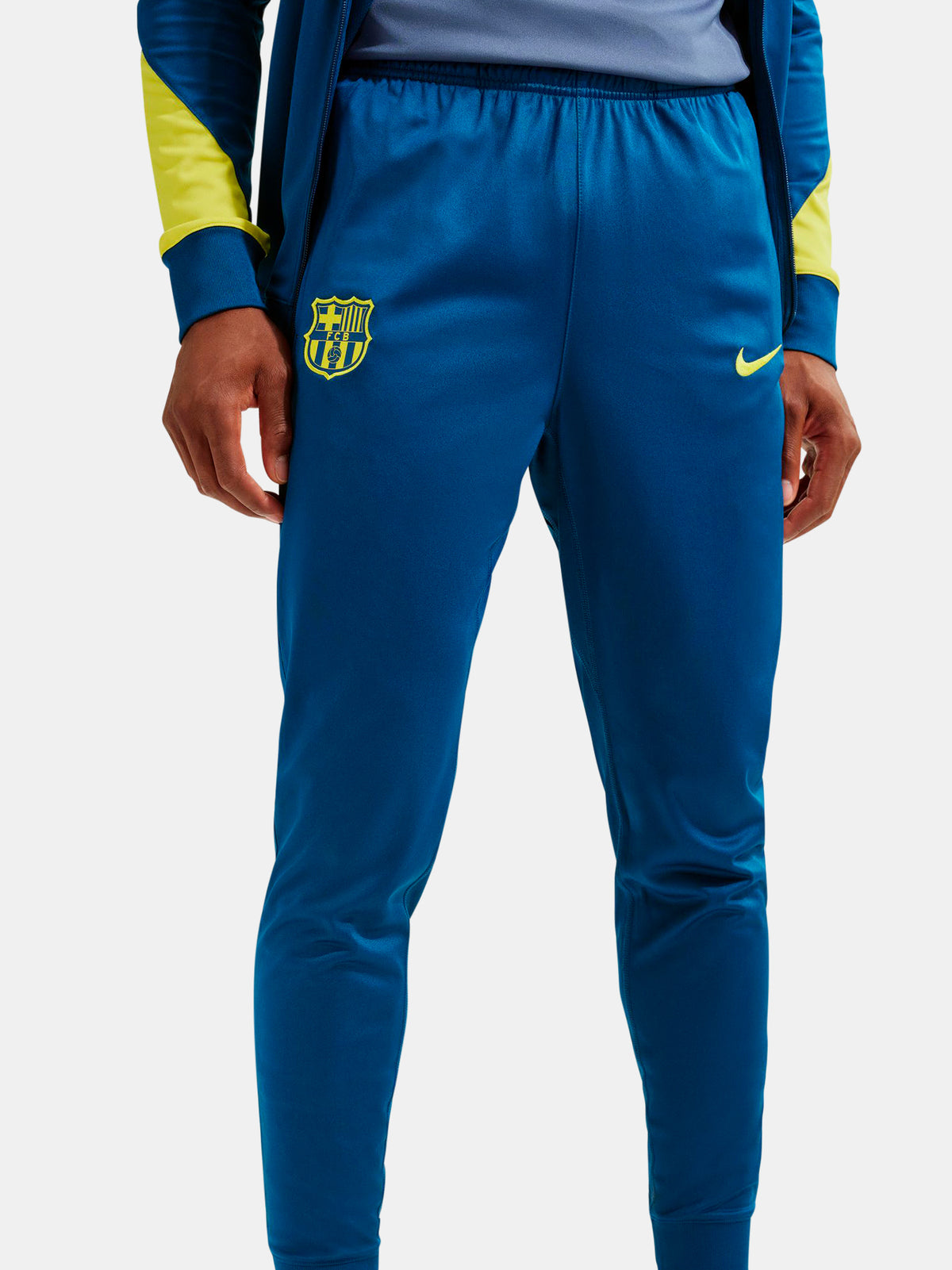 Blue sports pants with a logo on a white background