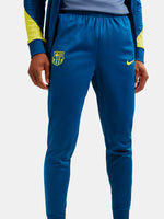 Blue sports pants with a logo on a white background