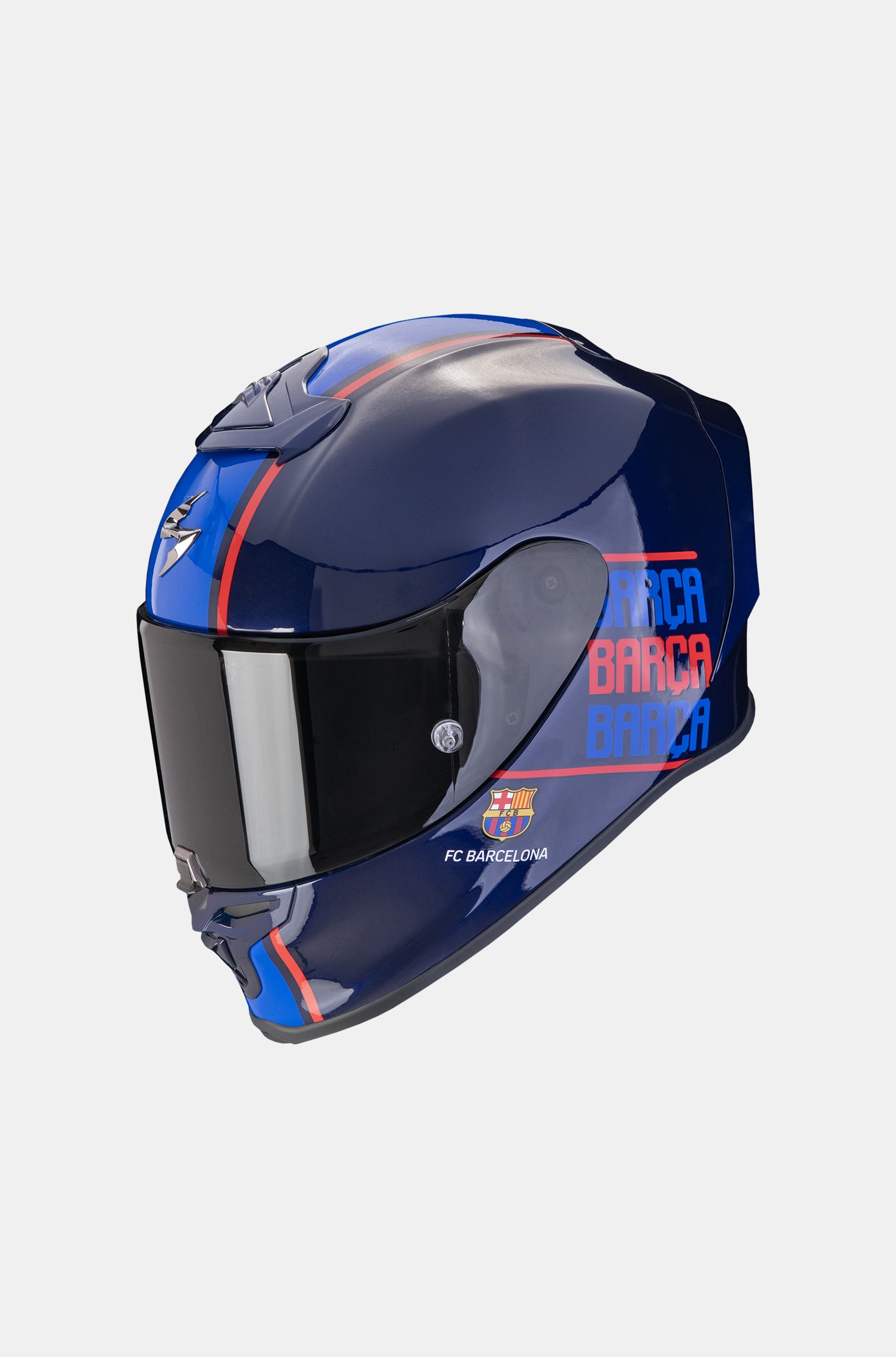 Full-face dark blue motorcycle helmet with red and blue 'Barça' lettering and the FC Barcelona crest on the side