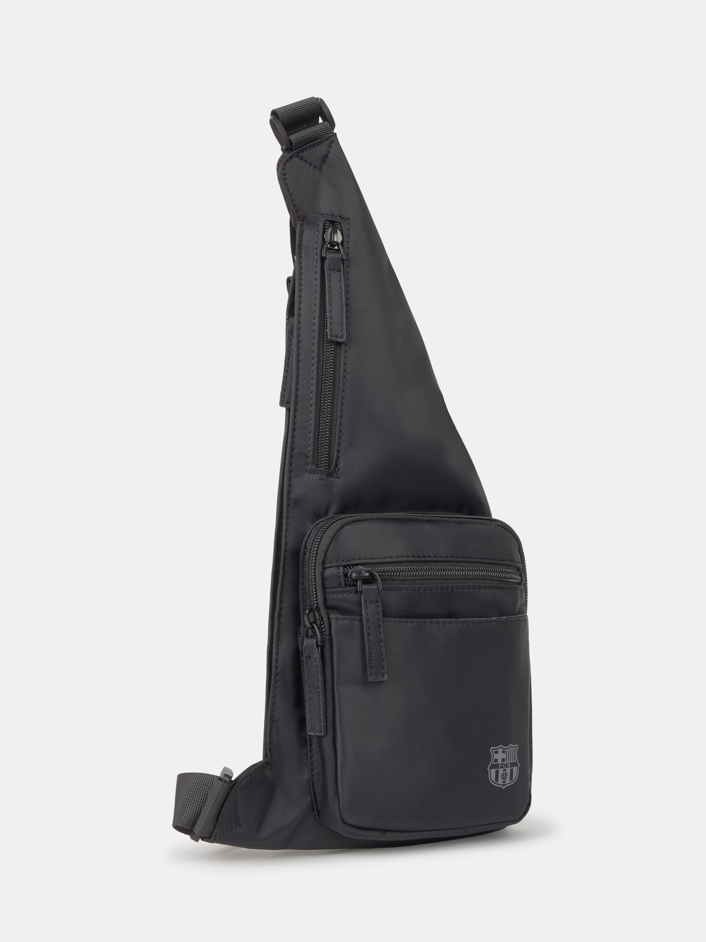 Black FC Barcelona crossbody bag with multiple zippered compartments and metallic club crest on the front pocket.