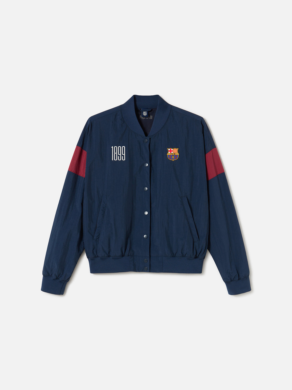 Navy blue FC Barcelona bomber jacket with red bands on the sleeves. The jacket features the club crest on the left chest and the year "1899" on the right chest, with a front snap button closure and ribbed cuffs and hem.
