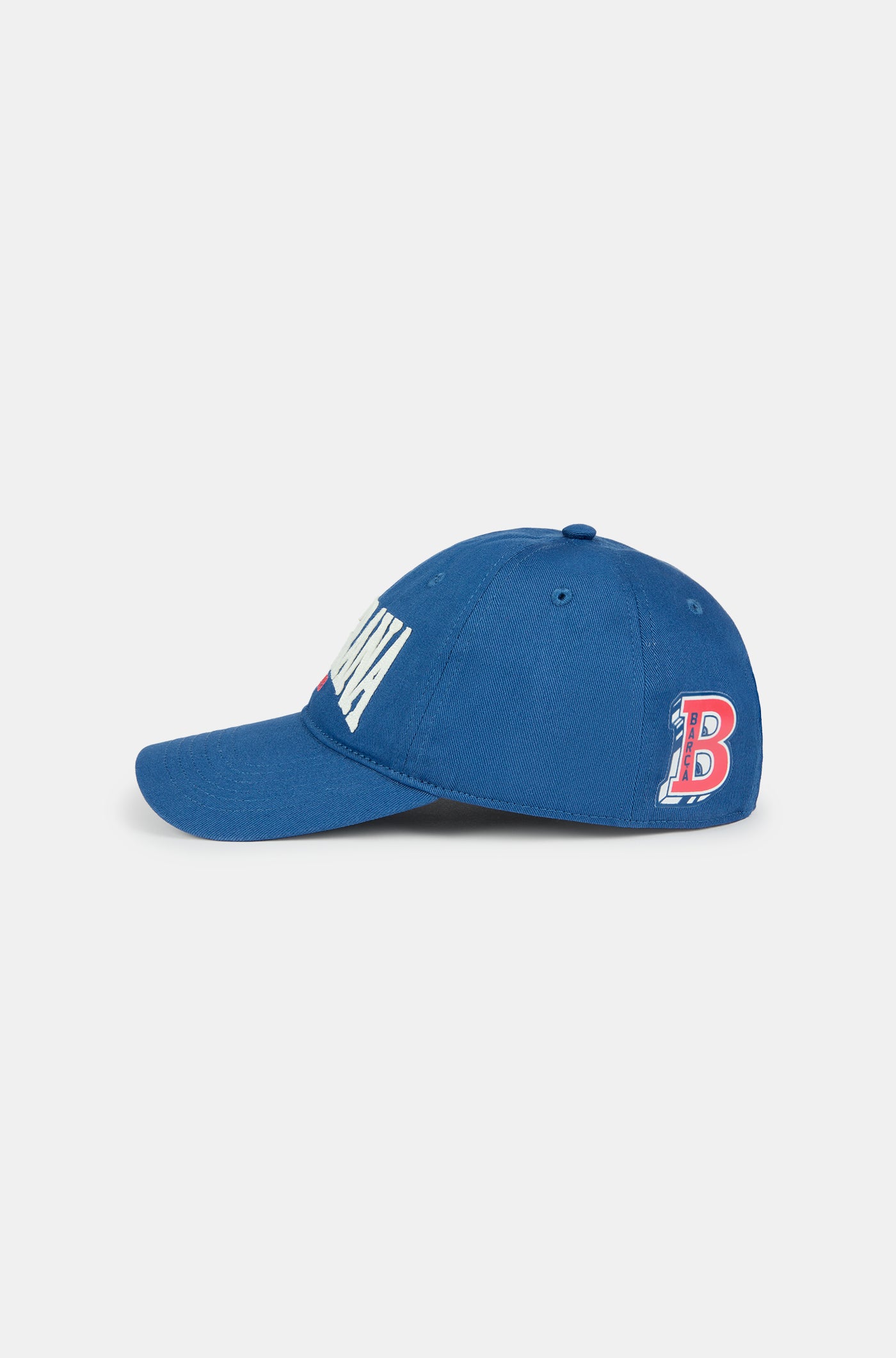 Blue FC Barcelona cap with "BLAUGRANA 1899" embroidered in white and red on the front, featuring a curved brim and a small Barça crest on the side.
